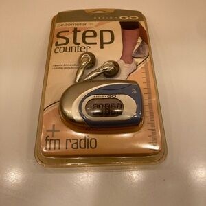Old school pedometer with radio and ear buds